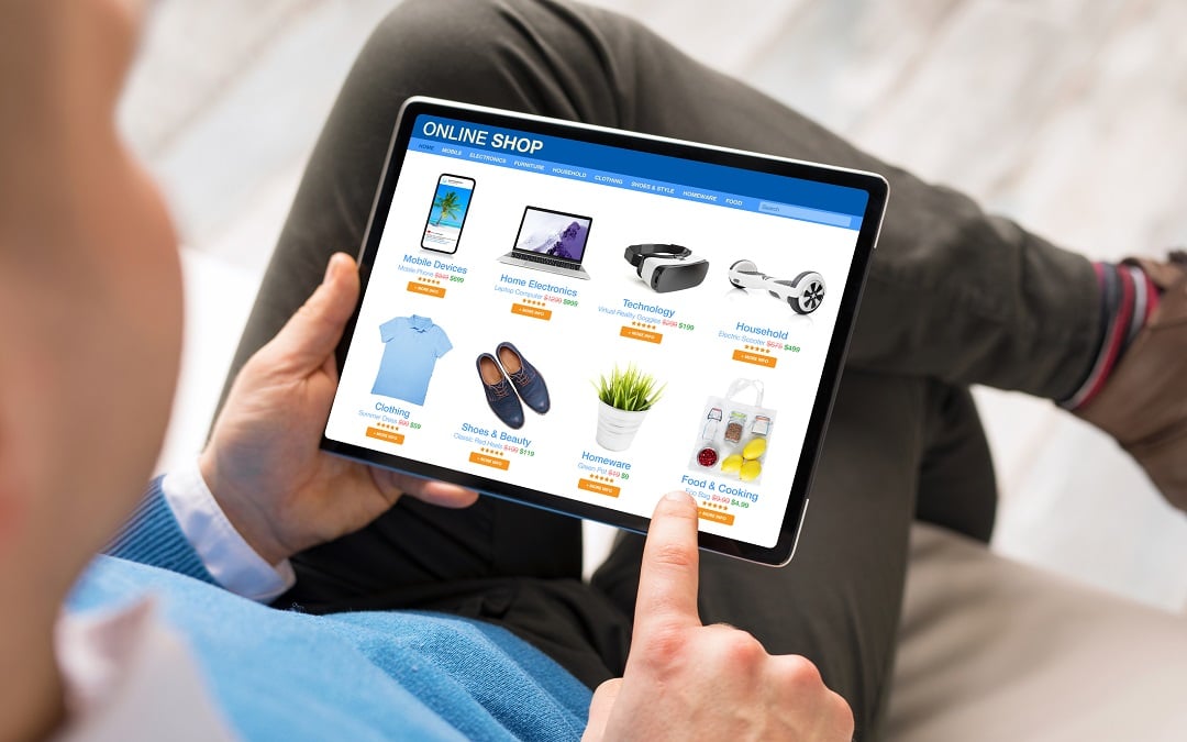Man shopping at online store on his tablet