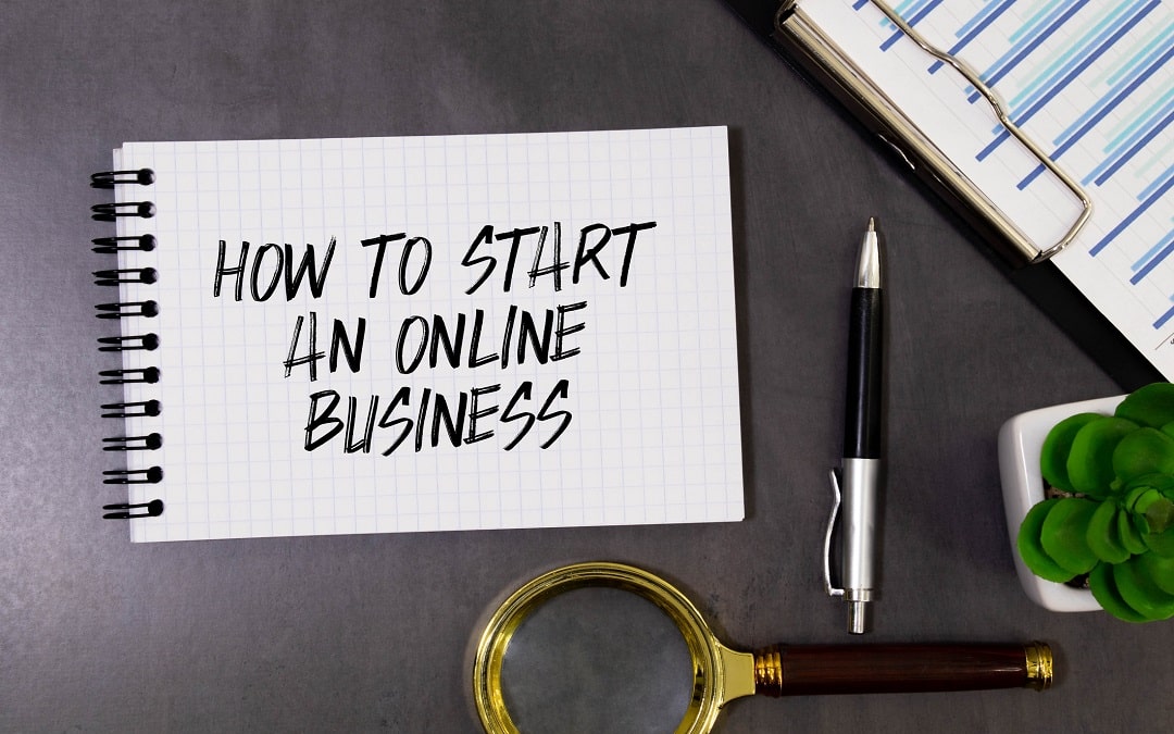 How to start an online business text on a blackboard