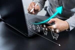 ecommerce scaling graphical represantation, ecommerce accountant with laptop